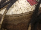 1893.67.4 - a close-up showing some of the quillwork on the garment