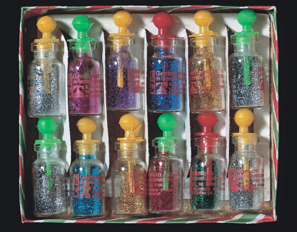 Bottles of eye glitter from Pakistan (1990s)