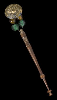 1918.16.28 Wooden lace bobbin with bead and button weights.