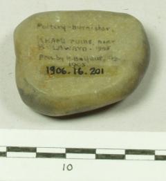 1906.16.201 Stone used as pottery burnisher, Khami ruins, Zimbabwe. Collected by Henry Balfour