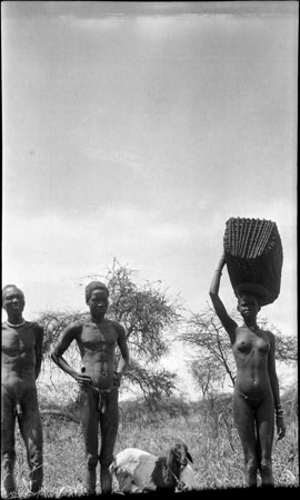 Nuer woman carrying basket