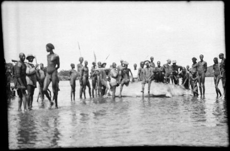 Nuer men with hippo