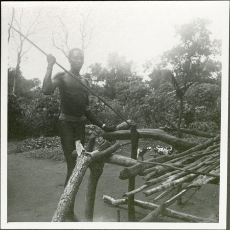 Mandari man with ?shrine