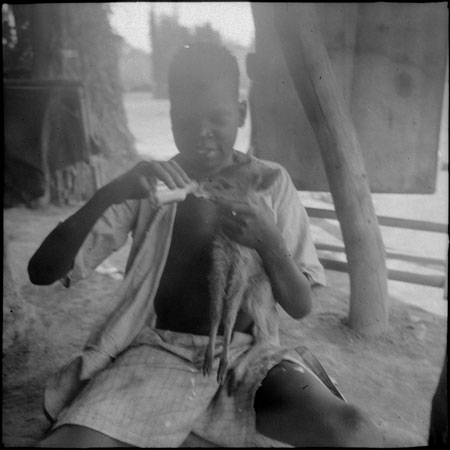 Mandari boy with young antelope