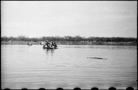 Nuer porters rafting baggage