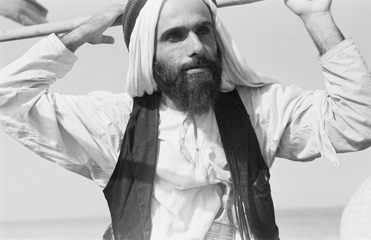 Portrait of Sheikh Hazaa bin Sultan Al Nahyan on a dhow (sailboat) in the Abu Dhabi islands.