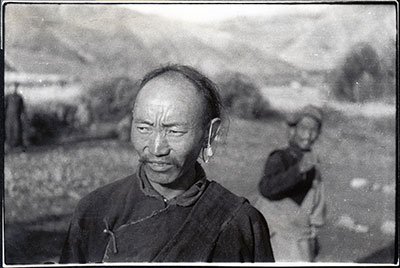 Tibetan man with ear ornament
