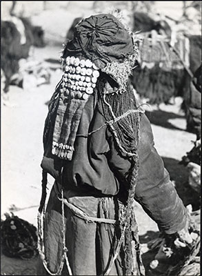 Horpa woman with hat and textile hair extension