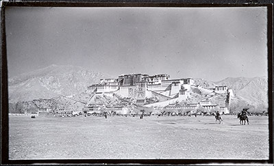 Potala with thankas unfurled on its south wall