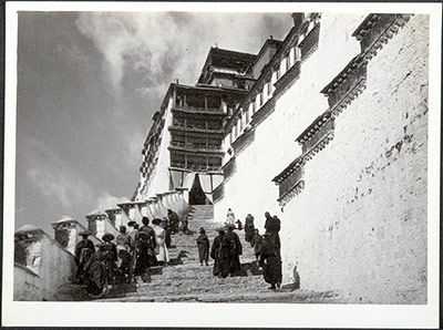Tibetan officials ascending the steps of the Potala