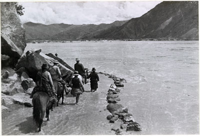 Mission party on flooded path near Nyethang