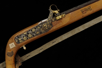 Close-up showing the hammer of the percussion musket