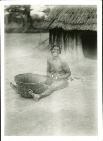 Zande woman with puppy