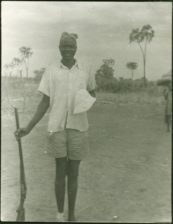 Mandari man with rifle