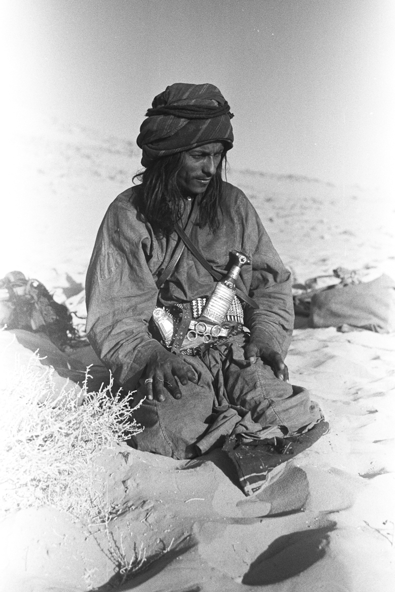 Seated portrait of ‘Amair bin ‘Omar, a tribesman of the Bayt Imani lineage of Rashid Bedouin
