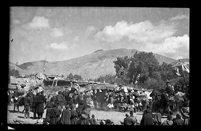 Dalai Lama's sedan chair in procession from Potala